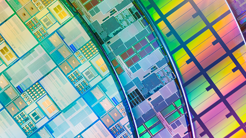 Silicon Wafers with microchips used in electronics for the fabrication of integrated circuits