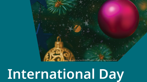 A Poster with a christmas tree branch with ornaments and the text "International Day"